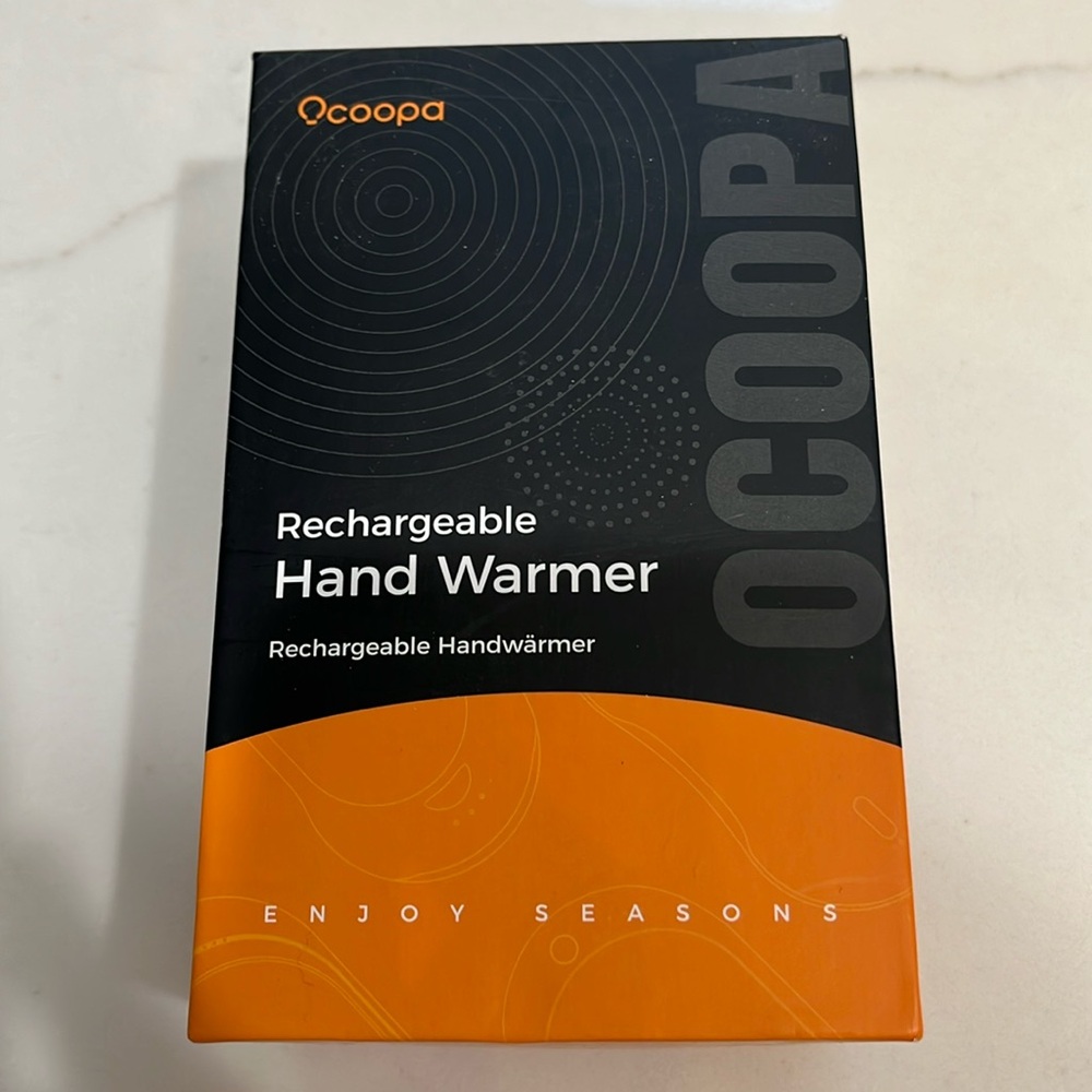 Ocoopa rechargeable hand warmer.